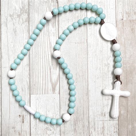 Chews life - Silicone Products. 1 2. Chews life | Silicone Rosaries for Children and Mamas | Gemstone Rosaries for Women and Men | Stretch and Wrap Gemstone Bracelets | Faith Resources & More!